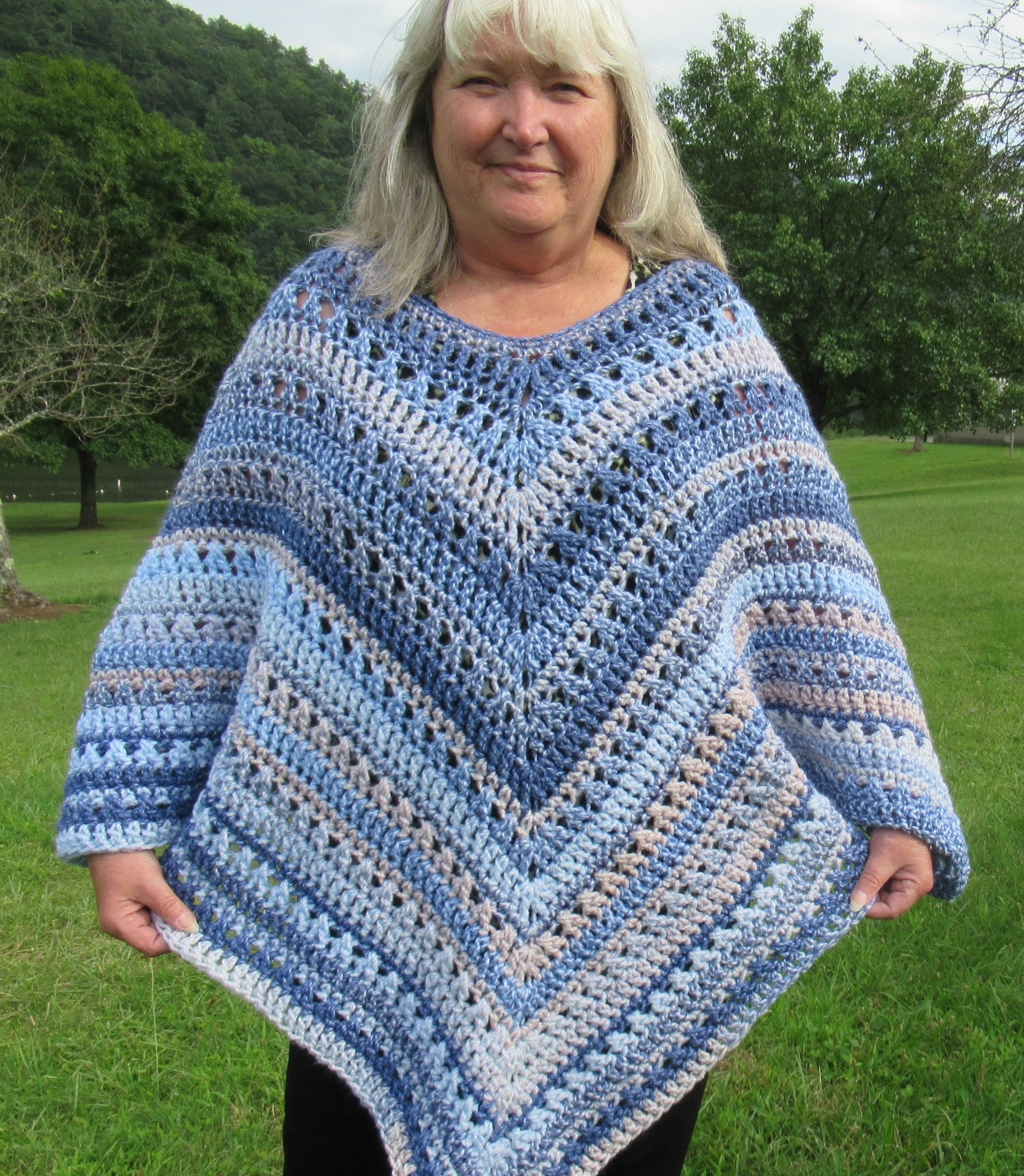 Gray, blue and white poncho and good headband set handmade by Celebrated Crochet. One size fits most ladies & plus size women.